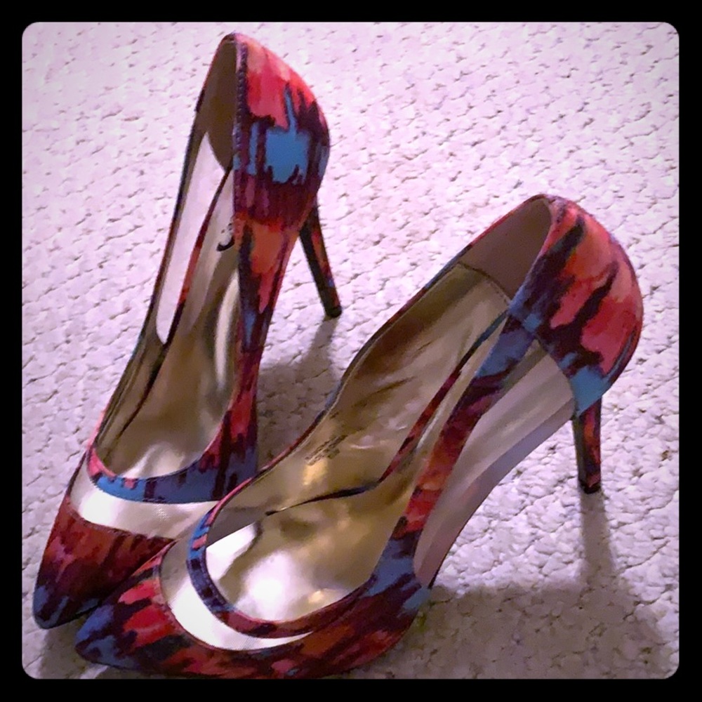 Multi-colored J.Reneé pumps with mesh cut-out.